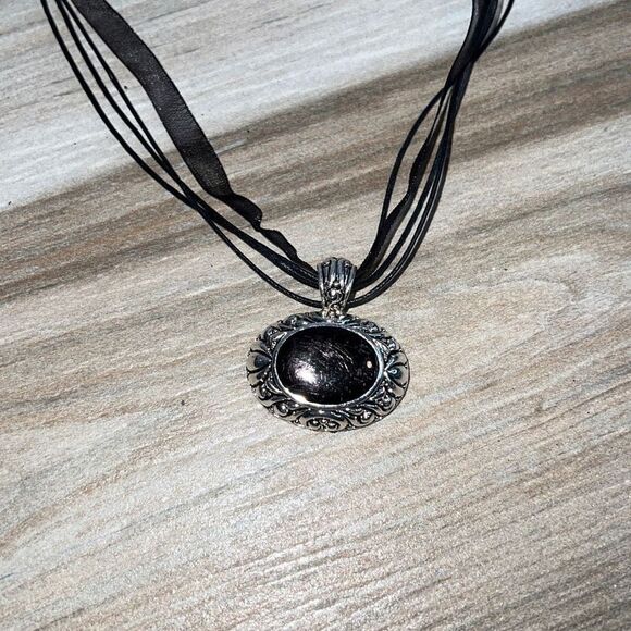 Oval Filagree Pendant With Black Center On Cord - Picture 1 of 6